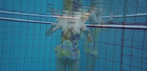  Sexiest brunette teen Milana Voda swimming in pool